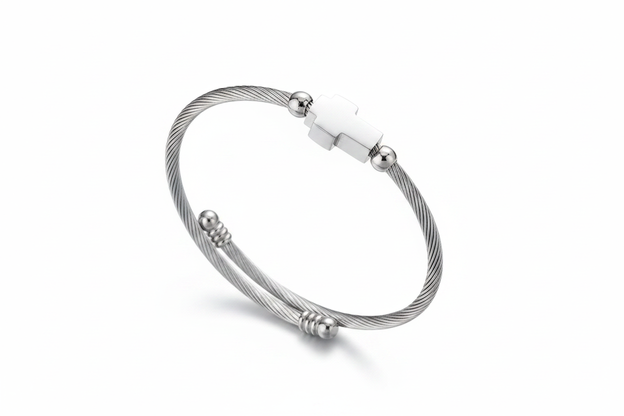 Bracelet with silver cross on white background