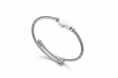 Bracelet with silver cross on white background