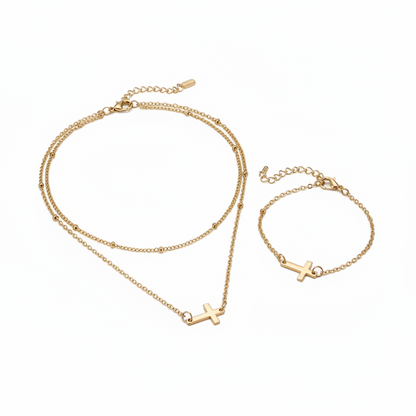 Gold Cross Jewelry Set on White Background