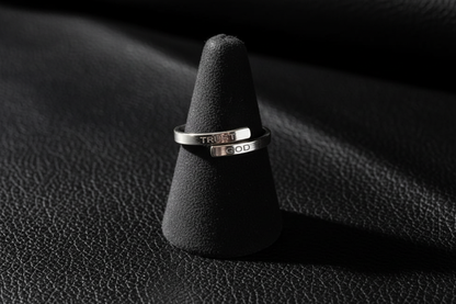 Trust God Silver Wrap Ring on black leather ring holder