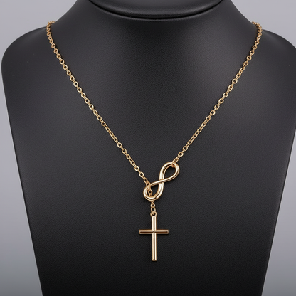 Gold infinity cross necklace close up detail shot